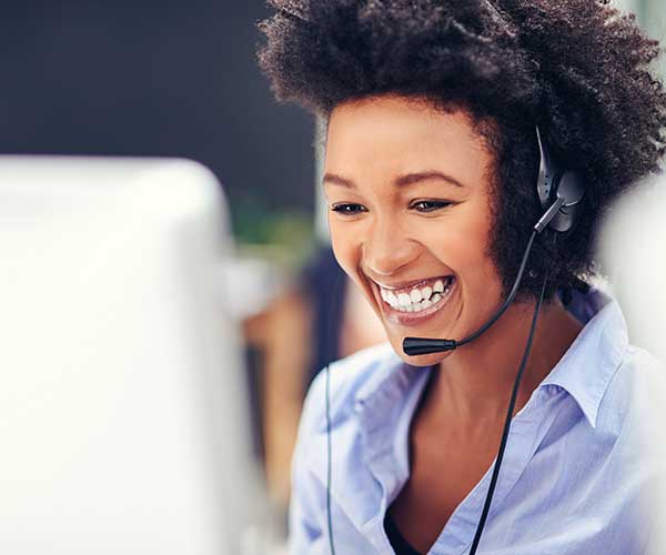 attractive young woman working in a modern call center