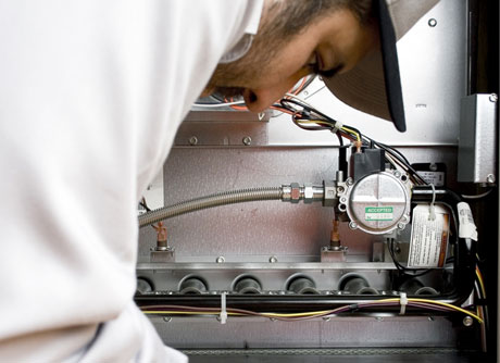 Technician working on food equipment